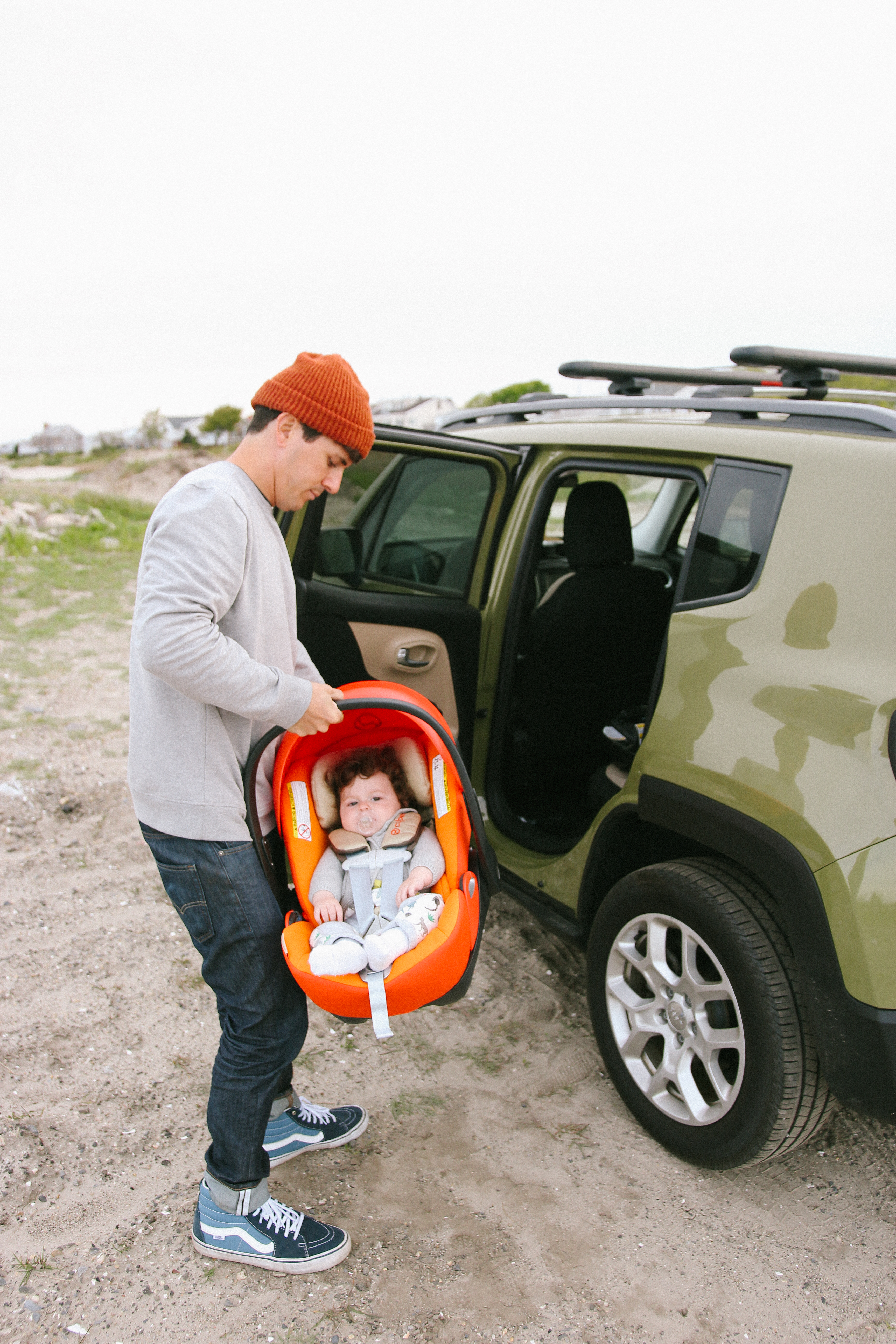 dad with carseat, orange carseat, cybex, cloud q, roadtripping with a baby
